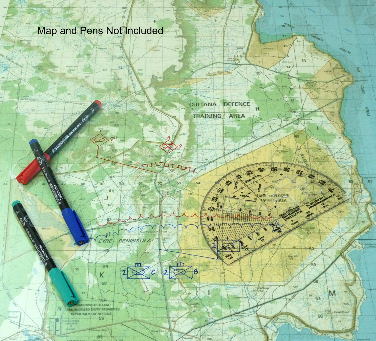 Semi circular map marking protractor in use on a military map