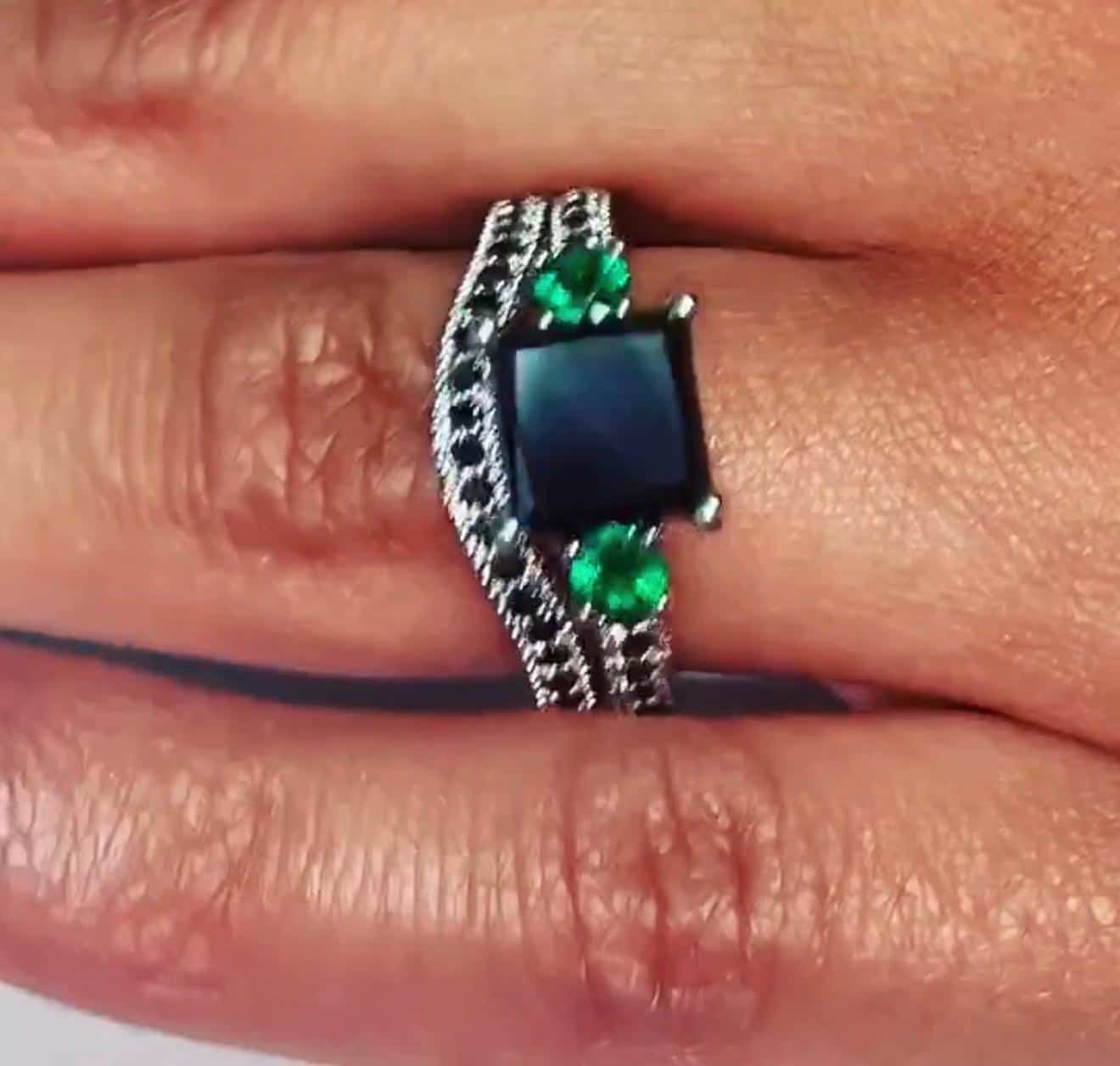 Custom black diamond and emerald ring