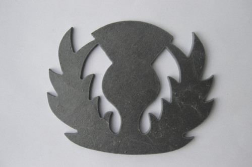 A stunning thistle coaster cut from natural slate and fully backed with soft red felt to protect your table tops.
This unique and highly decorative slate coaster makes a perfect gift for birthdays, Christmas and as a house warming present.
It can be used as a drinks coaster, candle stand, soap dish or simply to decorate the home.
Made and hand finished in Scotland, we ship worldwide. For international shipping costs, please contact us.
