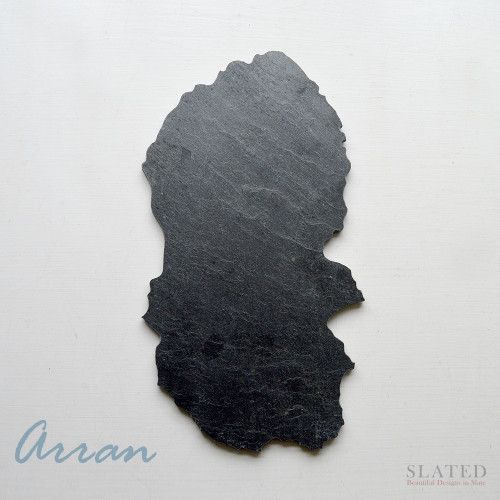 The Scottish island of Arran cut from natural slate for use as a tablemat or trivet, cheese board or platter. Also can be hung on the wall for use as a blackboard using one of our handing discs. See the Everything Else page of our website.
Our Arran slate makes the perfect gift for all those who have a connection with this beautiful island. 
Our slates are made in Scotland and make great birthday presents, wedding presents, Christmas presents and more.
Also available in medium and small sizes.