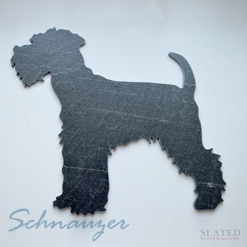 Our schnauzer shaped slate is made of natural slate and fully backed with soft felt and can be used as a tablemat or cheese board, or can be hung on the wall, using one of our easy to use hanging discs. 
A stunningly decorative gift for those who love these beautiful dogs. 