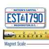 Washington, D.C. License Plate Magnet displayed with a measuring tape for size reference. Washington, D.C. License Plate Magnet displayed with a measuring tape for size reference.