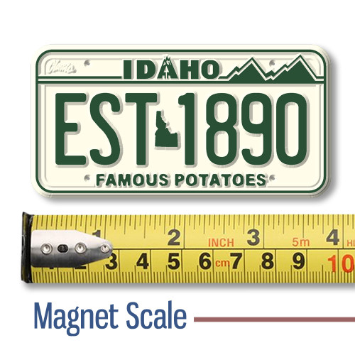 Idaho License Plate Magnet displayed with a measuring tape for size reference.