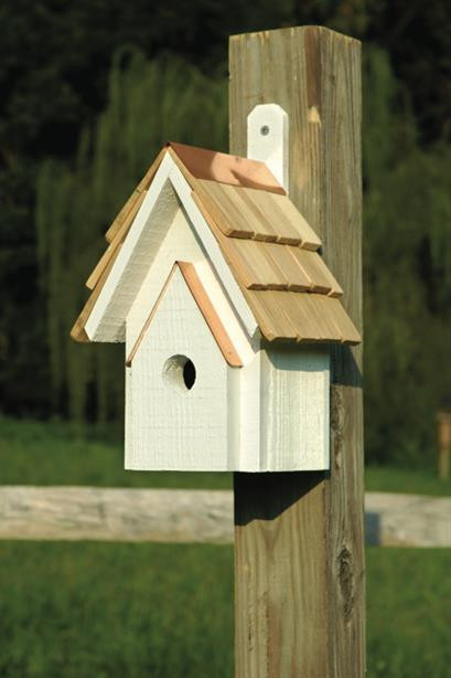 Handcrafted classic wooden birdhouse made from cypress with a hand-shingled roof, designed for outdoor use and small songbird nesting.