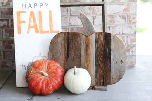 Rustic barnwood pumpkin made from reclaimed wood, perfect for fall porch and farmhouse decor