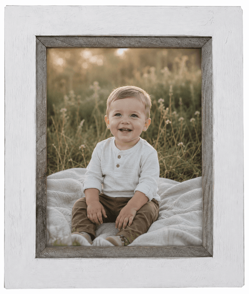 Whitewashed rustic wood picture frame handcrafted from reclaimed barnwood. Farmhouse-style photo frame featuring natural wood grain and a coastal-inspired finish for home decor and gallery walls.
