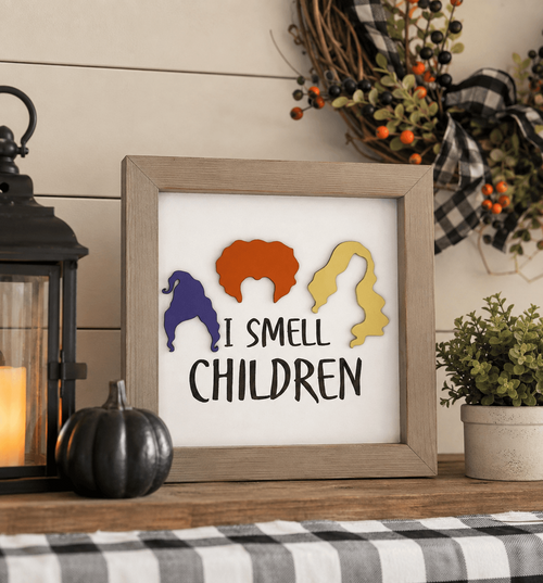 Handcrafted Hocus Pocus Halloween wood sign displayed on a farmhouse mantel with pumpkins, lanterns, and cozy fall decor.