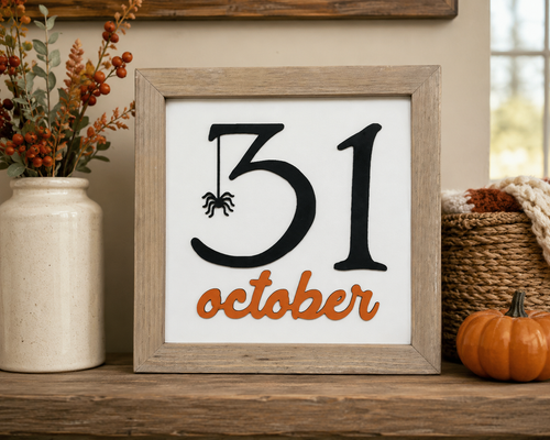 Handcrafted rustic wood October 31 Halloween sign with black numbers, orange script lettering, and a hanging spider accent in a natural farmhouse wood frame