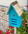 Wooden ladybug loft with red finish and decorative ladybug accent outdoor