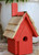 Front entry opening sized for small birds such as wrens and chickadees, designed for safe nesting and easy access.