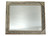 Large barnwood mirror with barbed wire accents displayed horizontally above mantel or console