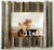 Farmhouse driftwood frame displayed with landscape artwork in neutral home decor