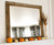 Rustic barnwood wall mirror featuring handcrafted alder trim overlay and reclaimed wood texture made in the USA