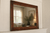 Sangria knotty alder mirror with rich wood tones and handcrafted rustic farmhouse styling