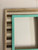Handcrafted rustic barnwood frame with painted accent boards for unique farmhouse decor