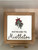 Handmade mistletoe door hanger with classic Christmas greenery and festive red ribbon.