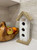 Handcrafted from natural wood, each birdhouse showcases unique grain patterns and rustic character for an authentic handmade feel.