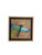Handmade 3D dragonfly wall art featuring vibrant colors on a wood background—bringing a nature-inspired, uplifting touch to any space.