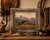 Handmade western wall frame with barbed wire detail and distressed barnwood texture