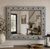 Bunkhouse style mirror with weathered barnwood frame and decorative tack accents