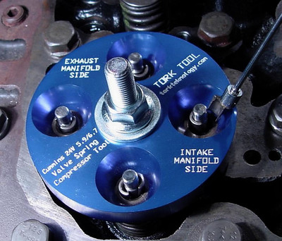 Valve Spring Compressor Tool for the Cummins Dodge Diesel 24 valve 5.9 & 6.7 - CVSC010. Holds the keepers while you install them and has a hard anodized aluminum top plate so your magnetic pencil doesn't stick to the tool.