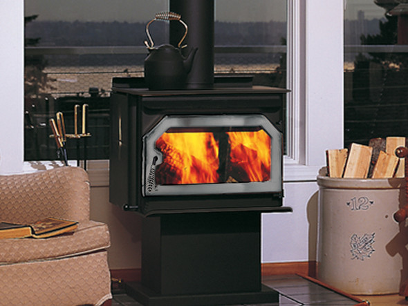 Striker S160 wood stove burning in living room