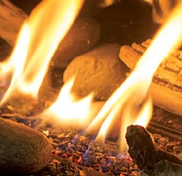 driftwood log set with rocks burning