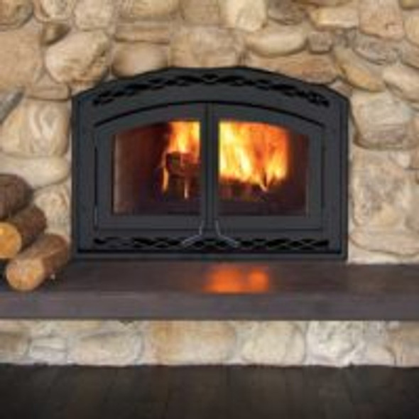 Montecito  Estate fireplace with hammered steel doors