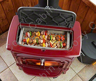 cooking grill with food cooking on the Dauntless stove