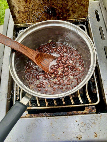 black beans cooking in pot