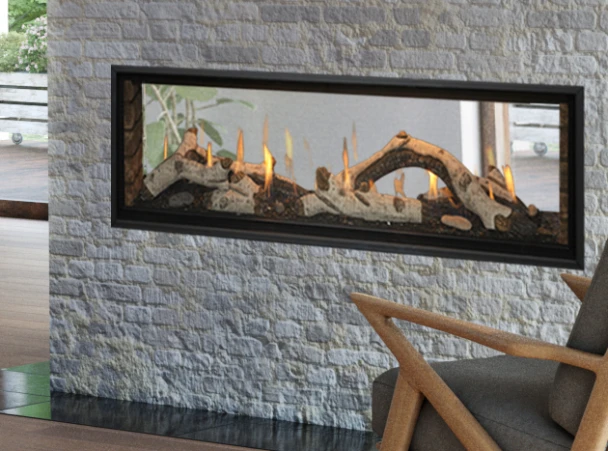 Callaway see thru fireplace with birch logs and Chicago brick panels