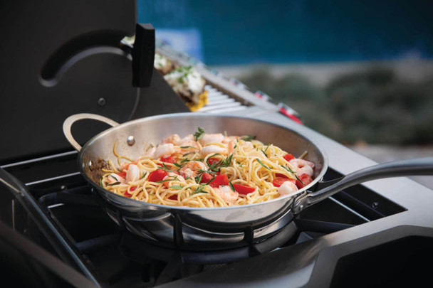 food in pot on side burner