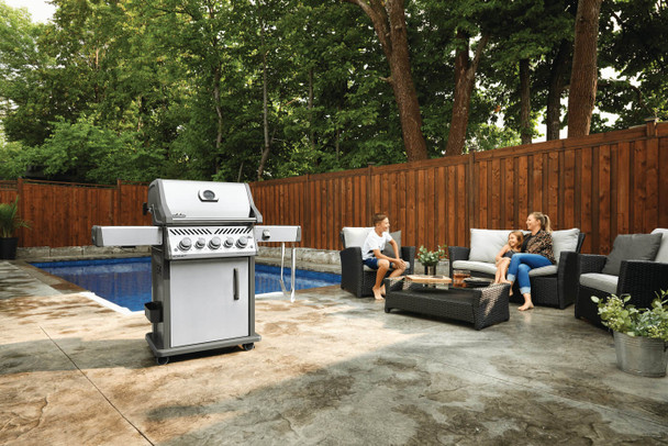 grill on a patio with people