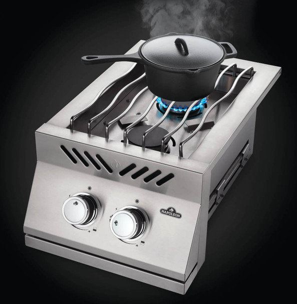 burner angled with pot cooking food
