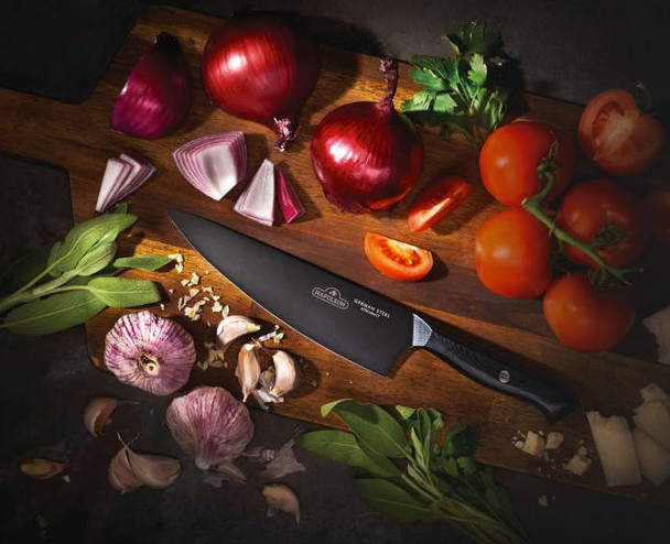 chef's knife on cutting board