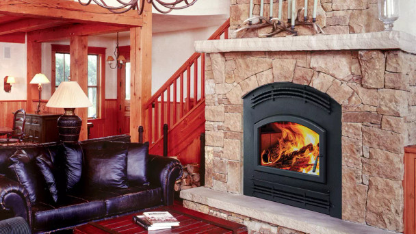 Pioneer III Wood Fireplace with forged arch front in living room