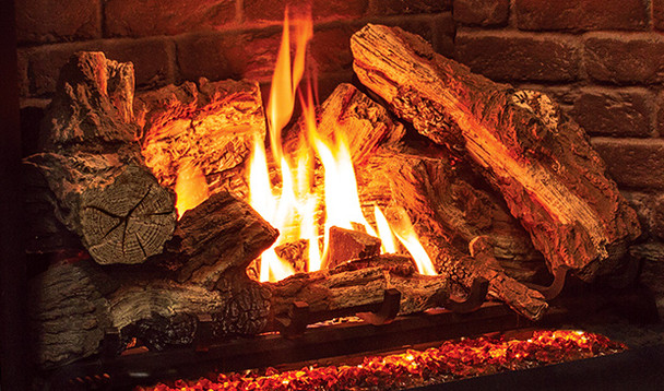 traditional log set and Rustic Brown brick interior burning