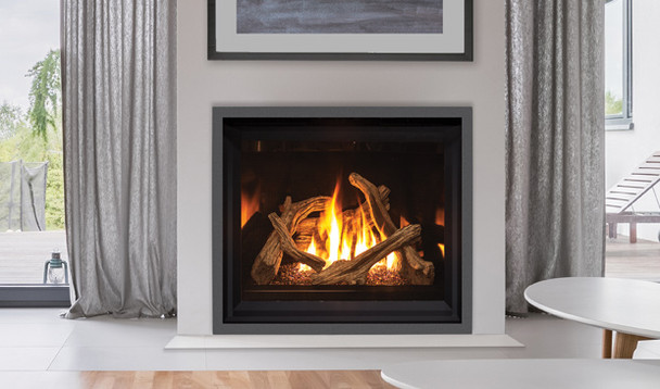 G42 gas fireplace with driftwood log set and black enameled interior in a living room