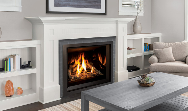 Q2 gas fireplace with driftwood log set and black enameled interior in a living room