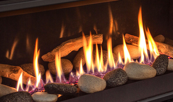 black glass liner, Urbana river rock set with twigs burning