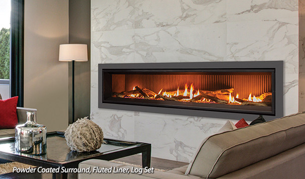 C72 gas fireplace with powder coated surround, fluted liner, rock and log set burning in living room