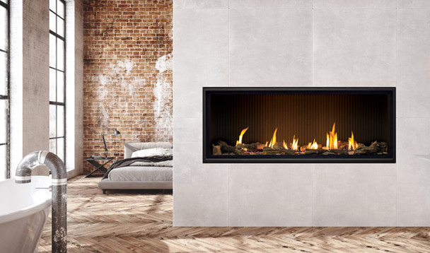 C60 Tall fireplace with fluted liner, traditional log set burning in a bathroom, looking into a bedroom