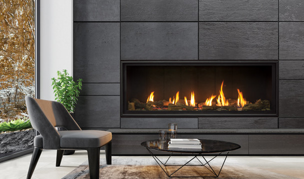 C60 Tall fireplace with painted steel liner and traditional log set burning in a living room