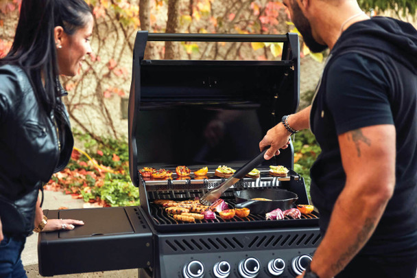 people grilling food