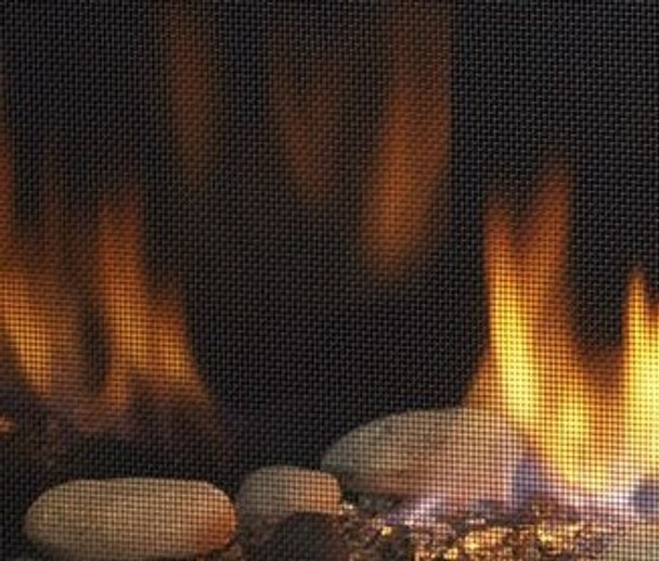 looking through a screen at rocks, embers and flames reflecting off of the black glass interior