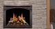 Nordik fireplace with arched mission screen front and birch logs