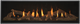 fireplace with Glass Panels, Black Sand Kit, & Traditional Log Set