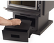 ash drawer being pulled out of stove