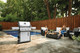 grill on a patio with people