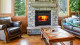 Pioneer III Wood Fireplace with mission arch front in living room